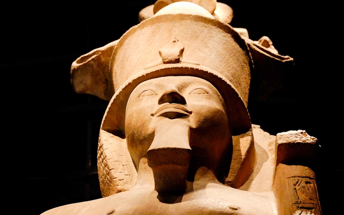 Ancient Egyptian statue at the Egyptian Museum, Cairo, featured in skip-the-line guided tour.