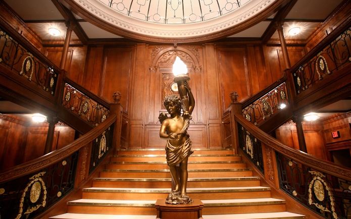 Grand staircase replica at Titanic Artifact Exhibition.