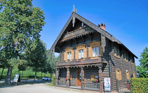 Historic wooden house in Potsdam, Germany, seen on a guided walking tour from Berlin.