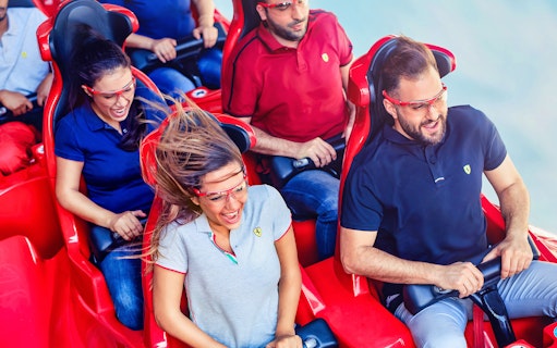 Visitors enjoying a roller coaster ride at Yas Island, Abu Dhabi.