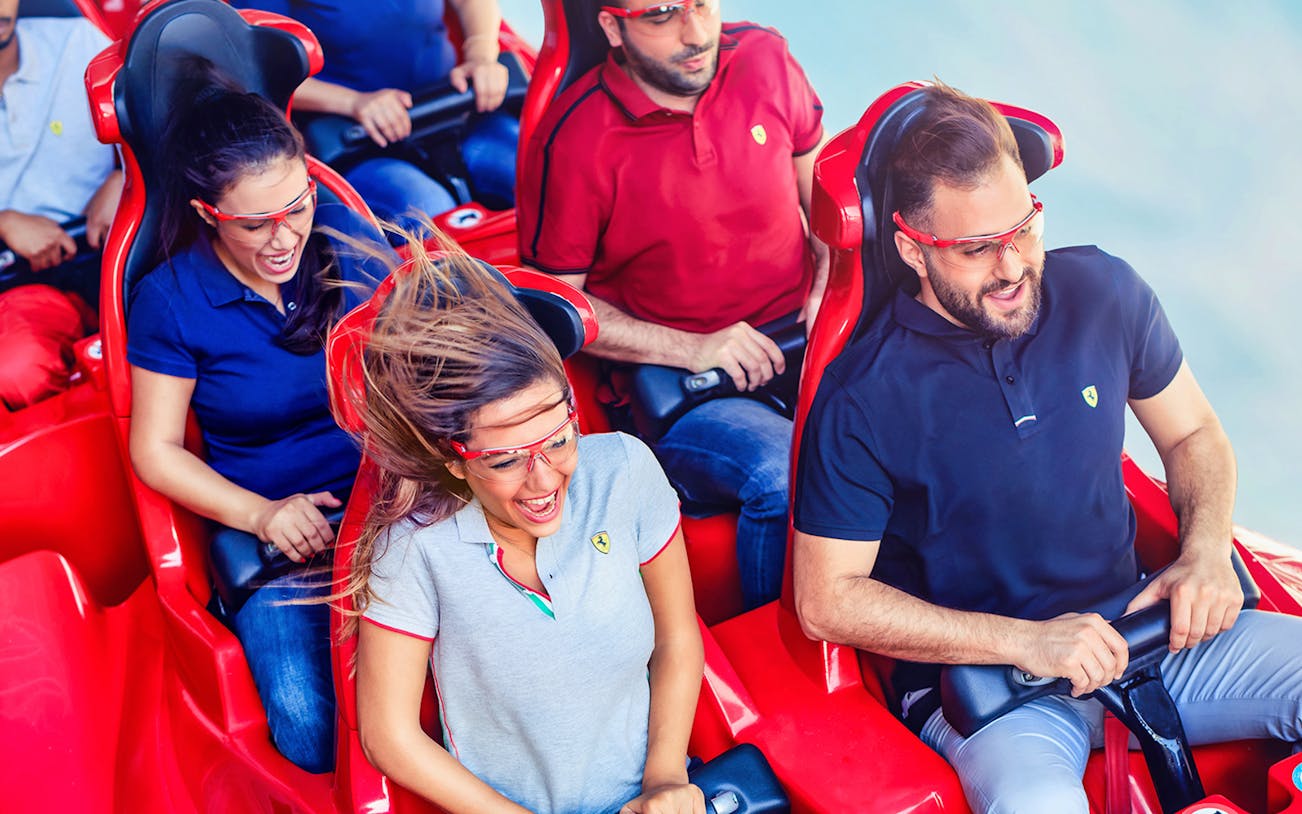 Visitors enjoying a roller coaster ride at Yas Island, Abu Dhabi.