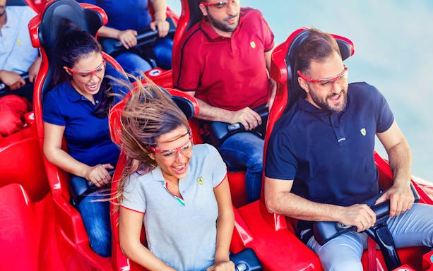 Visitors enjoying a roller coaster ride at Yas Island, Abu Dhabi.