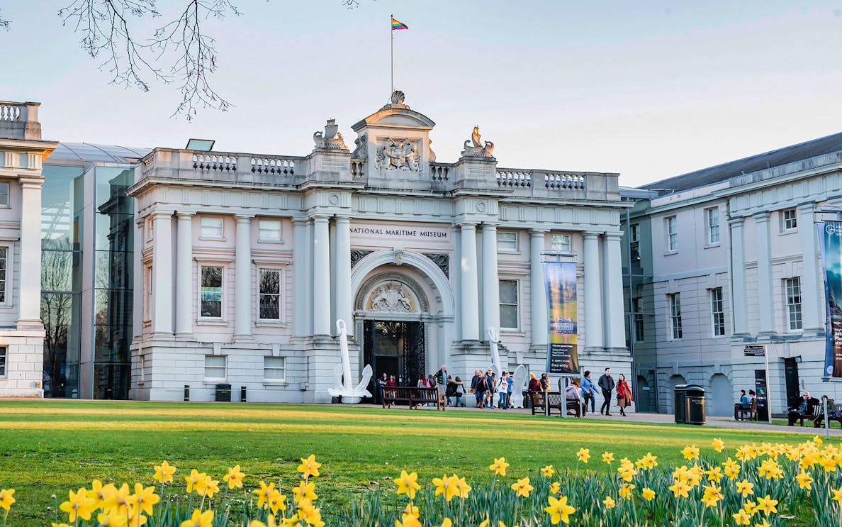 National Maritime Museum entrance with visitors, Greenwich, London.