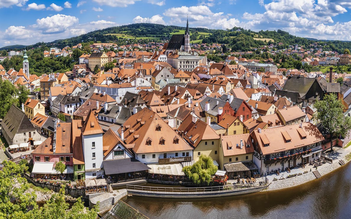 Český Krumlov aerial view with historic buildings and Vltava River, Czech Republic.
