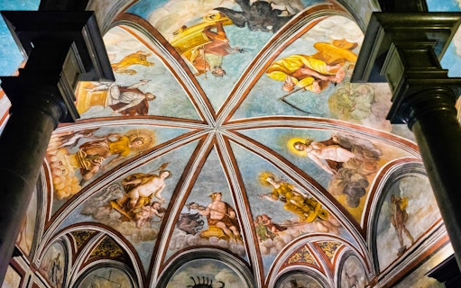 Frescoed ceiling in Leonardo's Vineyard, Milan, depicting mythological figures.