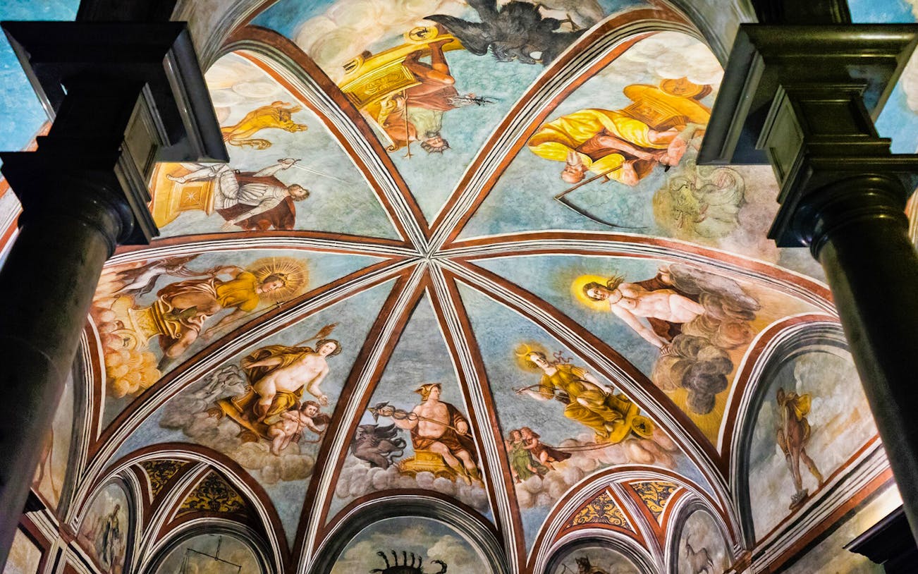 Frescoed ceiling in Leonardo's Vineyard, Milan, depicting mythological figures.