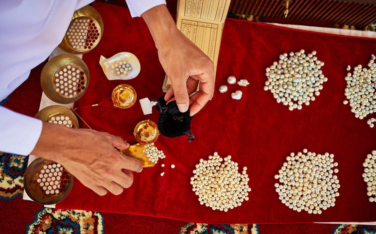 Sorting pearls at Al Suwaidi Pearl Farm, UAE.