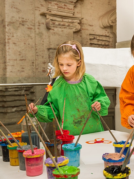Children painting during a workshop at Klosterneuburg Monastery.
