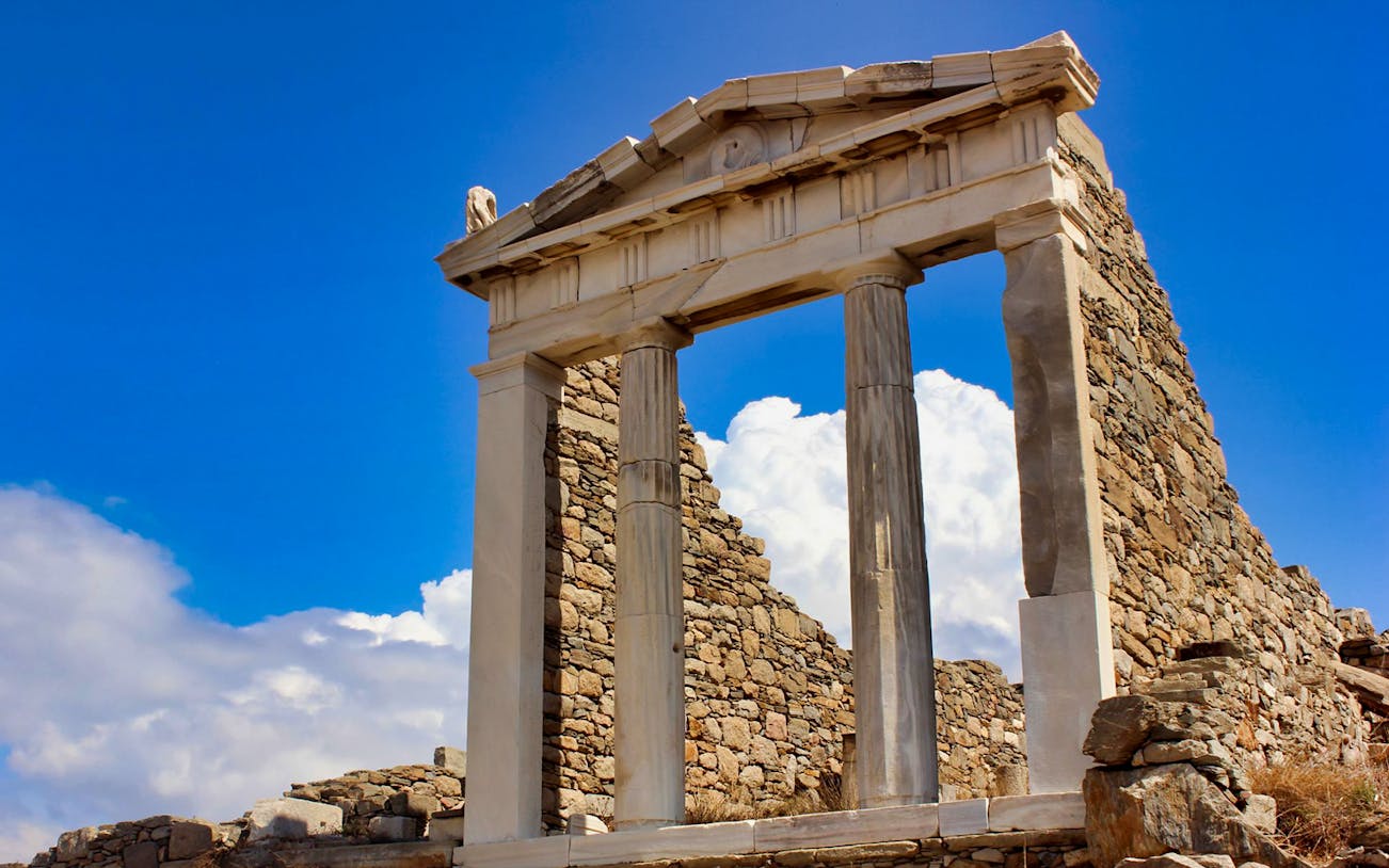 Ancient ruins with columns at Delos Archaeological Site, Mykonos.
