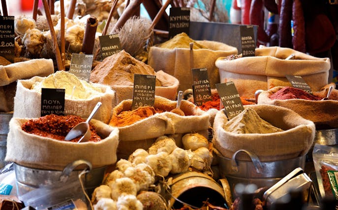 Spices and garlic displayed at a market in Athens during a food tour.