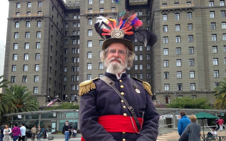 Emperor Norton reenactor in front of historic San Francisco building.