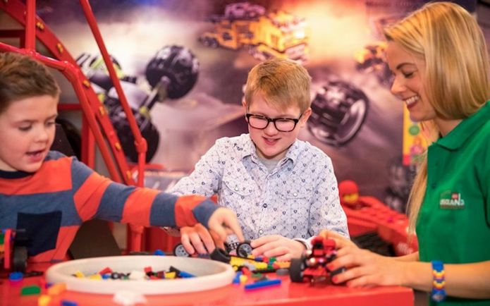 Children building with LEGO bricks at LEGOLAND Discovery Centre Oberhausen.