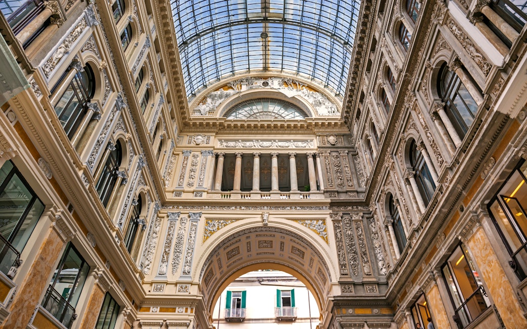 Diego Maradona mural in Naples, Italy, on a guided tour highlighting his legacy.