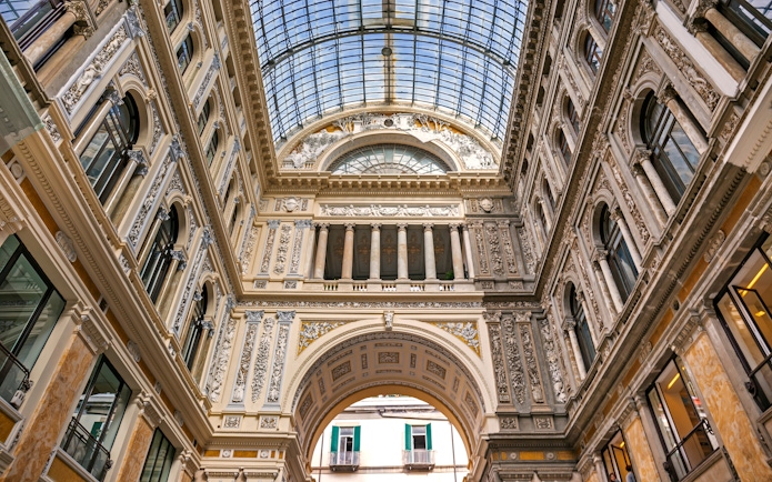 Diego Maradona mural in Naples, Italy, on a guided tour highlighting his legacy.