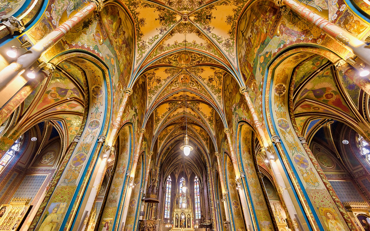 Vyšehrad Castle interior with ornate arches and detailed frescoes, Prague.
