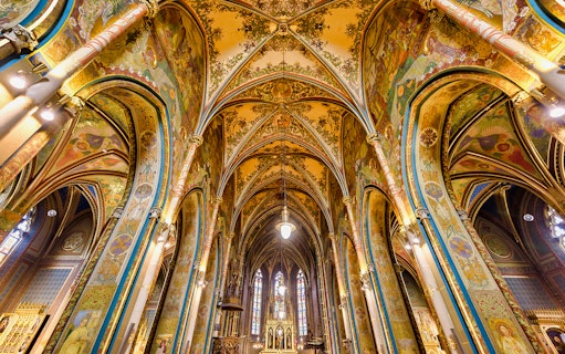 Vyšehrad Castle interior with ornate arches and detailed frescoes, Prague.