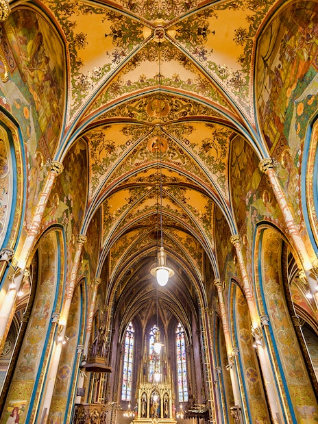 Vyšehrad Castle interior with ornate arches and detailed frescoes, Prague.