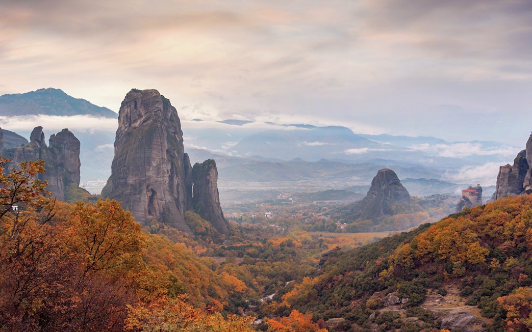 Meteora rock formations with autumn foliage, view from Athens to Meteora full-day trip.
