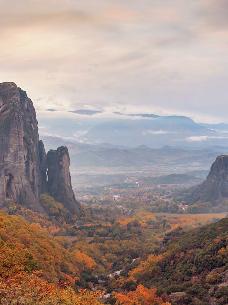 Meteora rock formations with autumn foliage, view from Athens to Meteora full-day trip.