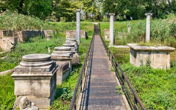 Ancient ruins and columns at Dion archaeological site near Mount Olympus, Greece.