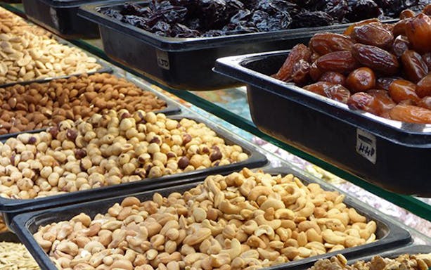 Dried fruits and nuts displayed at Thessaloniki open market food tour.