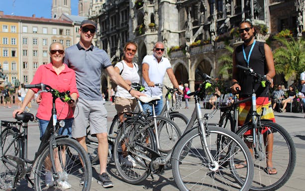 Group of cyclists in Marienplatz, Munich during a bike tour.