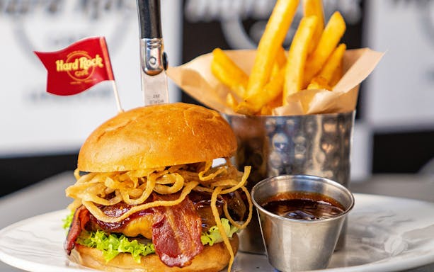 Burger with bacon and fries at Hard Rock Cafe Prague.