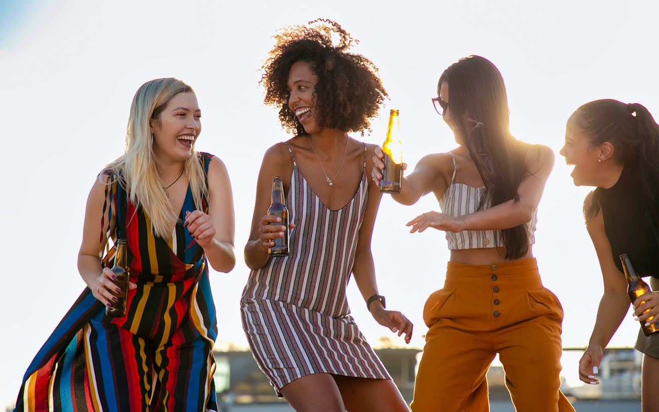 Group enjoying a night party on a boat at Athens Riviera.
