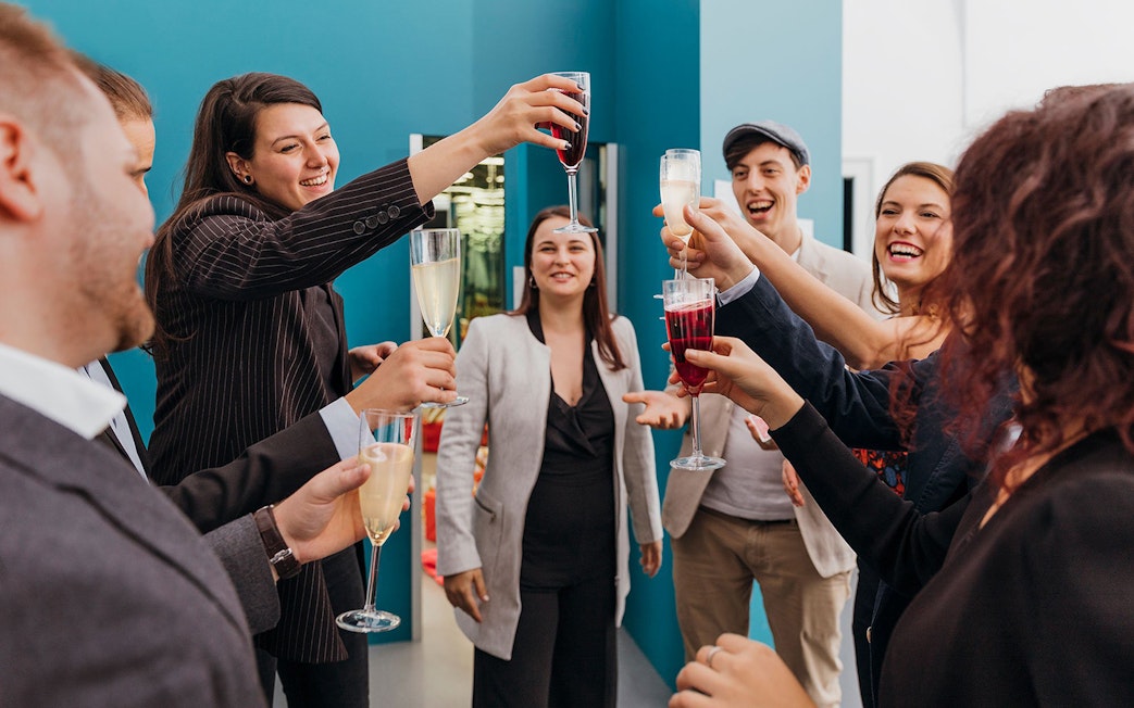 Group enjoying drinks at Museum of Illusions Vienna.