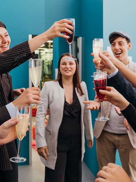 Group enjoying drinks at Museum of Illusions Vienna.