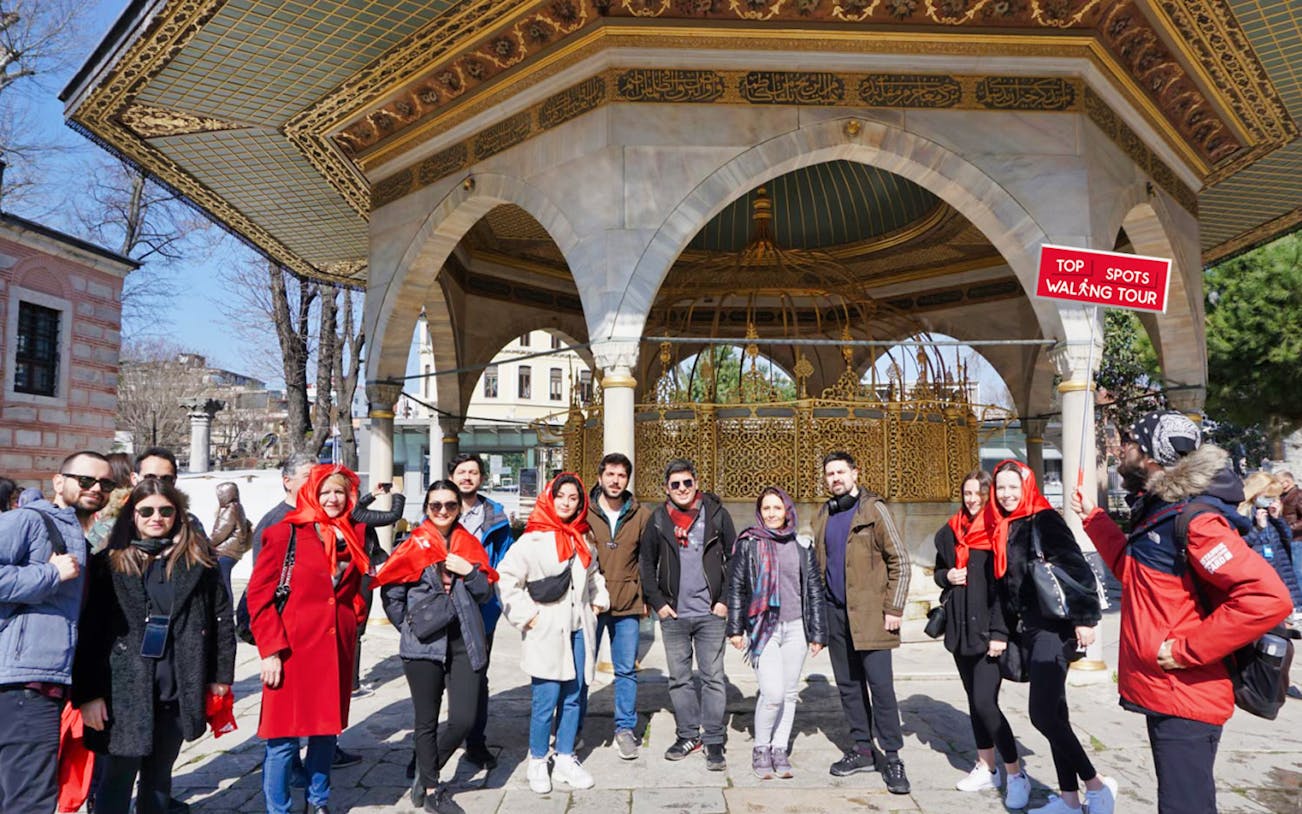 Group of tourists at a historic pavilion on the Top Spots Walking Tour between Old City and Taksim.