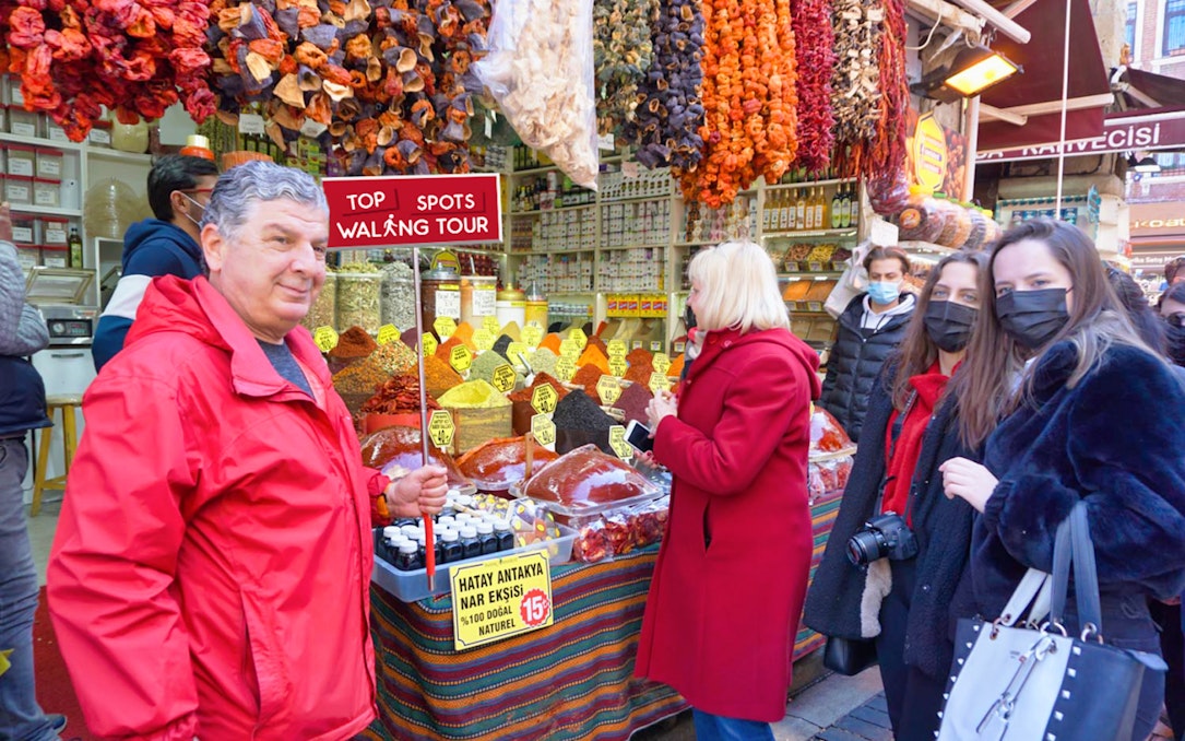 Tourists exploring a spice market on the Top Spots Walking Tour between Old City and Taksim.
