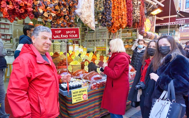 Tourists exploring a spice market on the Top Spots Walking Tour between Old City and Taksim.