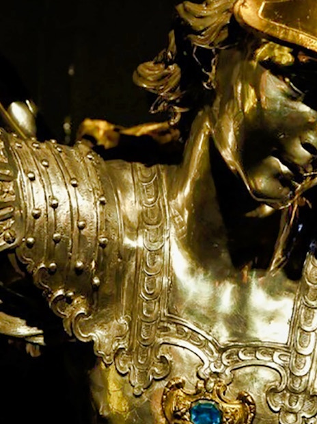 Statue of a warrior in armor at the Museum of the Treasure of San Gennaro.