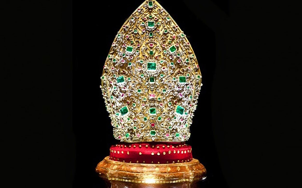 Golden mitre adorned with emeralds and jewels at the Museum of the Treasure of San Gennaro.