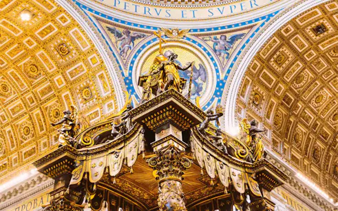 St. Peter's Basilica interior with ornate dome and altar details, Vatican City.
