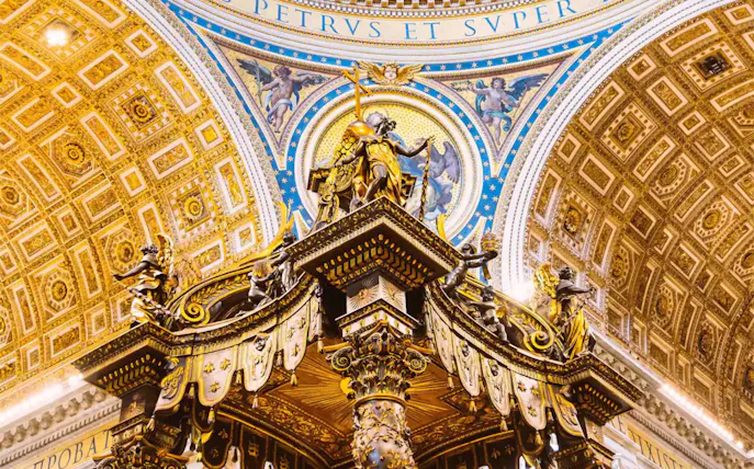 St. Peter's Basilica interior with ornate dome and altar details, Vatican City.