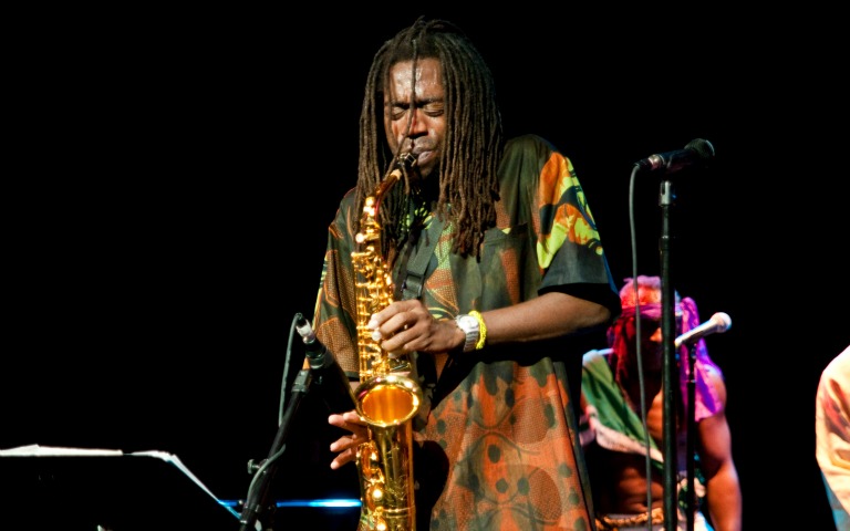 Saxophonist performing at Harlem Juke Joint Tour.