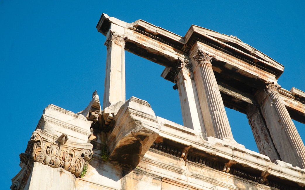 Temple of Olympian Zeus columns against blue sky, Athens audio tour.