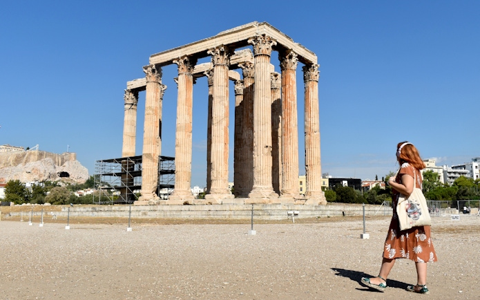 Temple of Olympian Zeus with visitor, Athens, Greece.