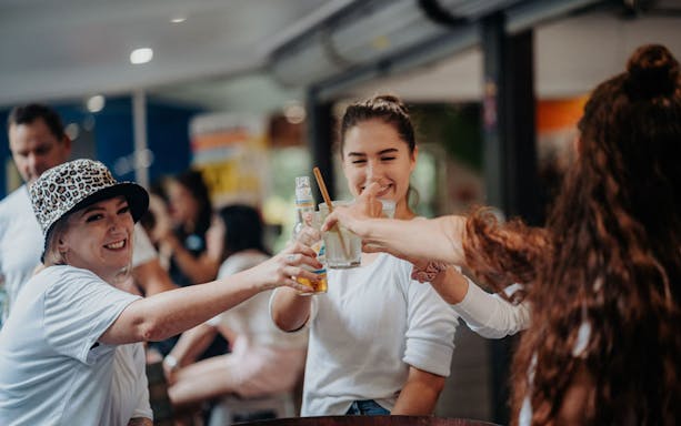 Group enjoying drinks at Skypark Cairns Adventure Day Pass.