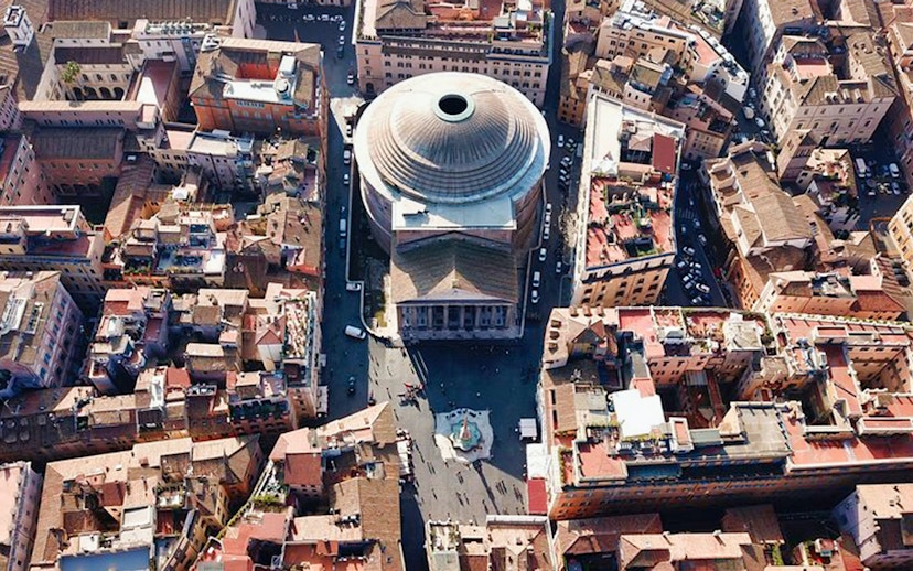 Aerial view of the Pantheon in Rome surrounded by historic buildings.