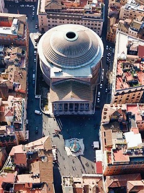 Aerial view of the Pantheon in Rome surrounded by historic buildings.
