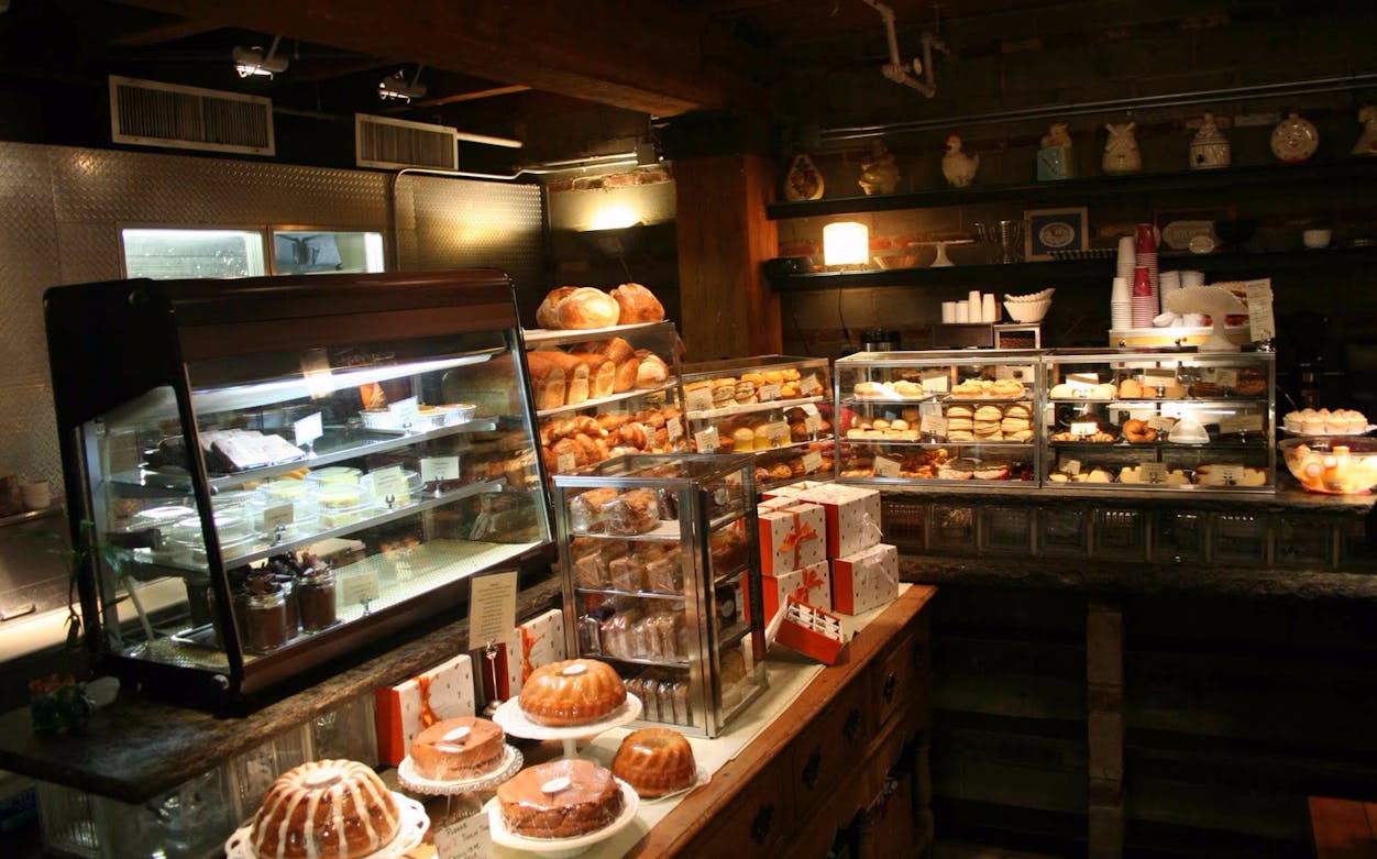 Bakery display with pastries and cakes at Chelsea Market, New York City.