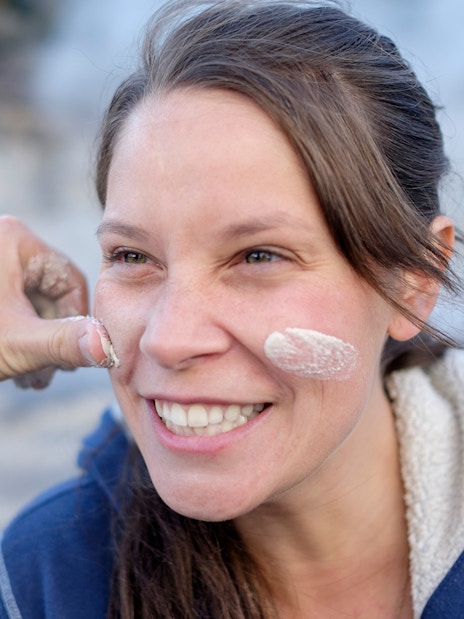 Person enjoying a mud facial at Hell's Gate geothermal park.