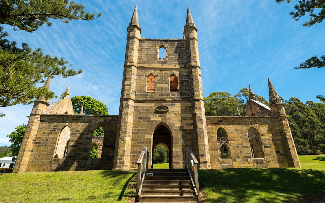 Port Arthur Historic Site church ruins with stone arches and spires, Tasmania.
