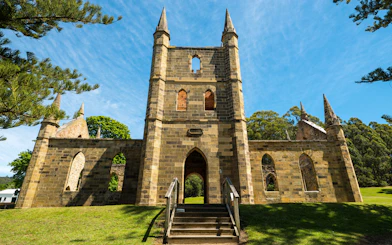 Port Arthur Historic Site church ruins with stone arches and spires, Tasmania.