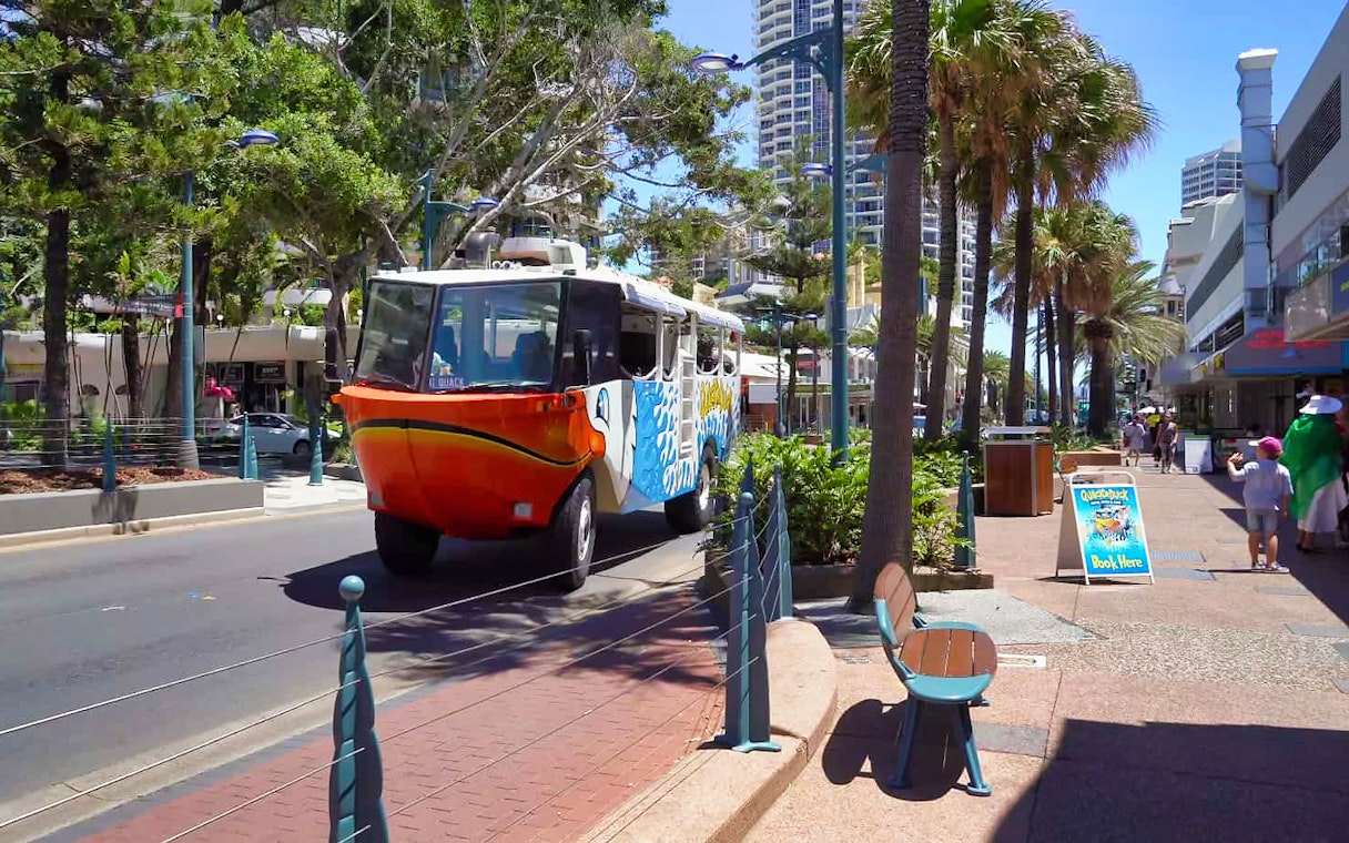 Amphibious vehicle on Gold Coast street for Quack'R Duck Cruise and City Tour.