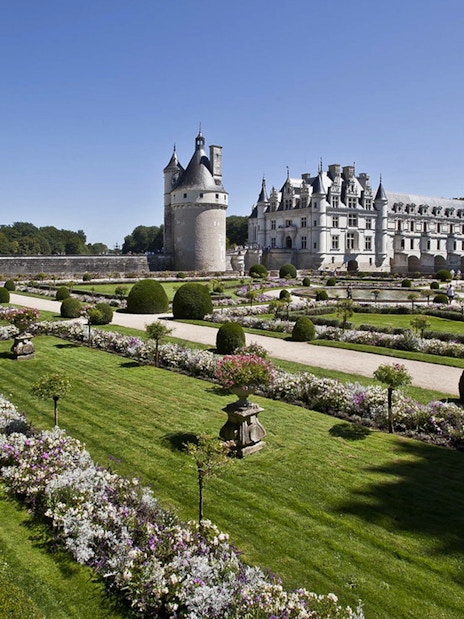 Chenonceau Castle with formal gardens in Loire Valley, France.