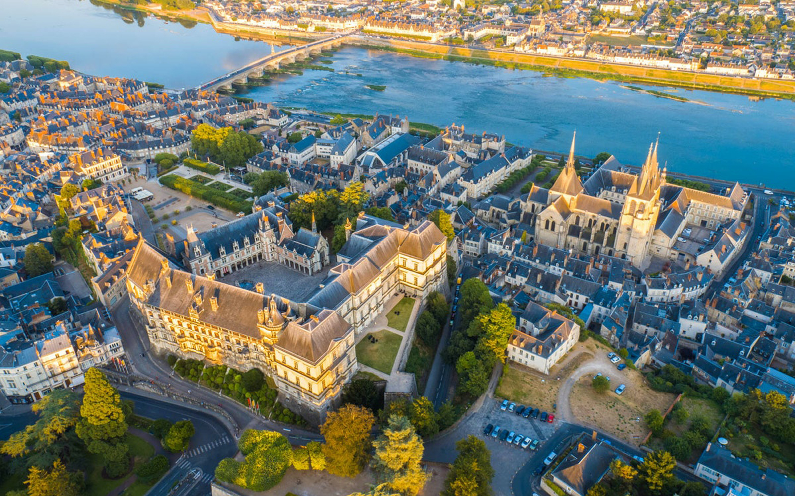 Aerial view of Blois Castle and surrounding town by the Loire River, France.